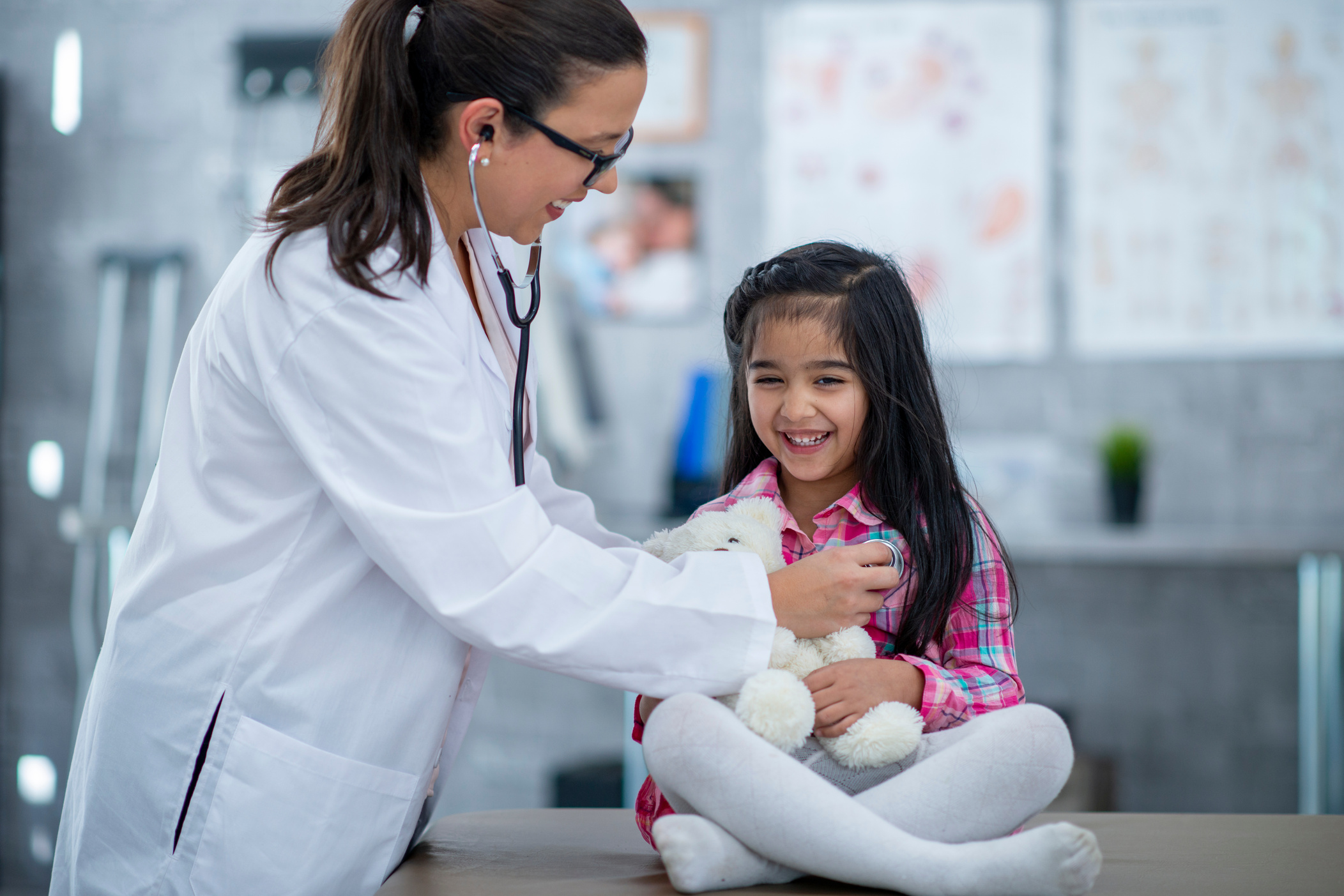 An image of a clinician examining a child. Clinicians at Grace Healthcare and Urgent Care Center in Raeford are able to examine children over the age of 2 years old. 